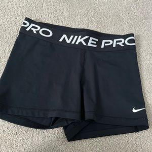 Black nike pros size medium